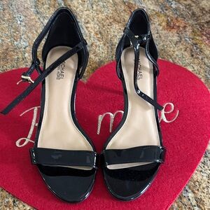 MICHAEL Michael Kors Black Heels with Ankle Straps and Elegant Design